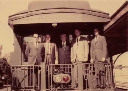 Southern Pacific personnel, D.S Gibson on the right Southern Pacific personnel, D.S Gibson on the right
