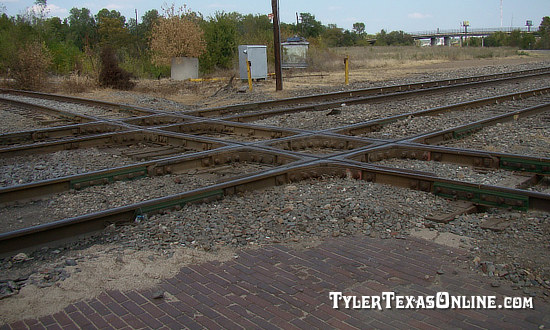 The diamond crossing of the Cotton Belt and I&GN tracks in downtown Tyler, Texas, at Tower 183